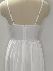 White midi dress with adjustable straps and a-line skirt