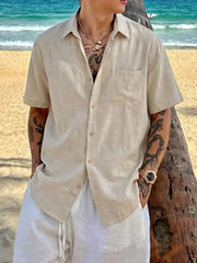 Relaxed fit beige buttoned casual shirt with short sleeves and a chest pocket.
