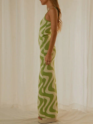 Geometric knit maxi slip dress in Yellow-Green with wavy pattern, sleeveless, and floor length.