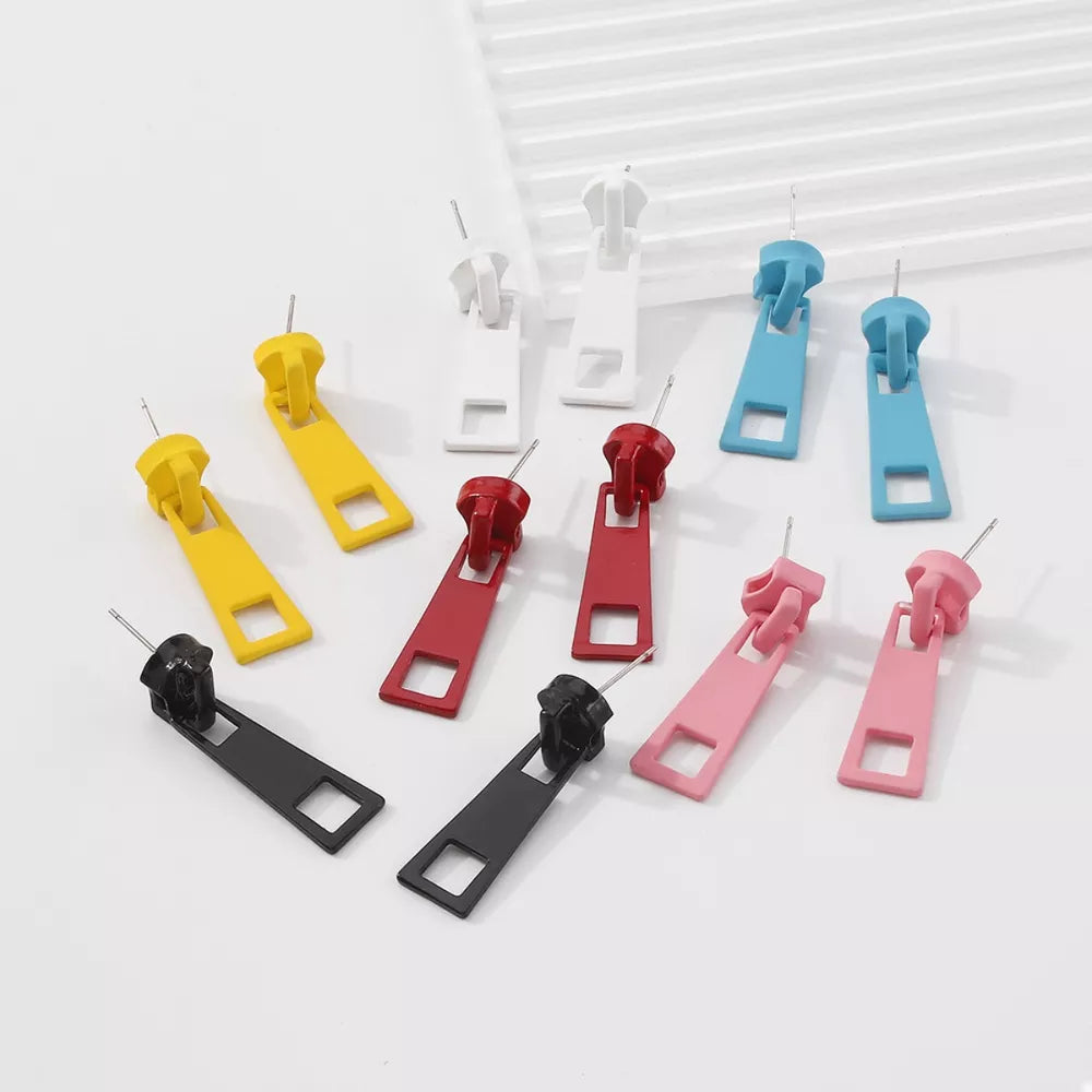 Zipper drop earrings in black, blue, red, yellow, white, and pink.