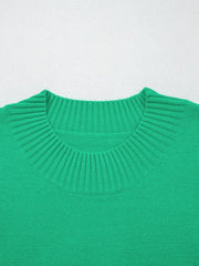 Green ribbed knit top with ruffled round neck