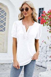 White tee with ruffled placket and puff sleeves