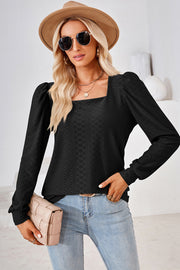 Black diamond-textured puff sleeve top with square neckline.