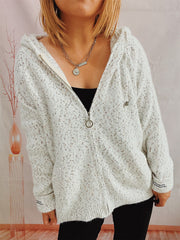Speckled knit relaxed zip-up hoodie in white with a round zipper pull and casual styling.