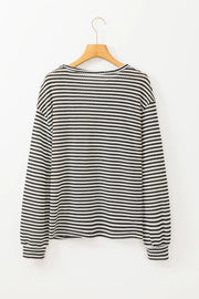 Black and white striped long sleeve tee with a crew neck.