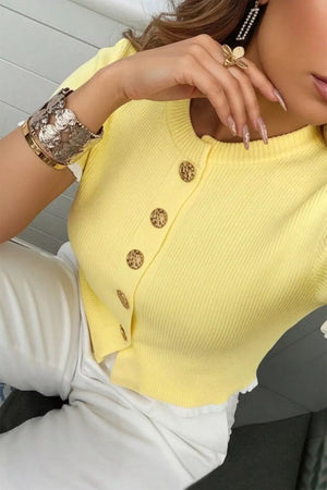Yellow ribbed short sleeve cardigan with gold buttons and frilled trim detail.