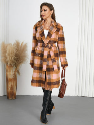 Belted bouclé overcoat in plaid with pink and brown tones, featuring a tie waist and notched lapels.