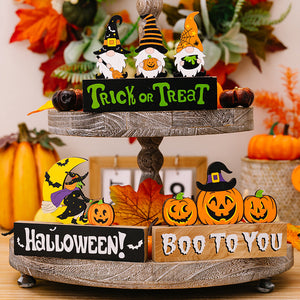 Halloween gnome trio display with pumpkins and trick or treat sign