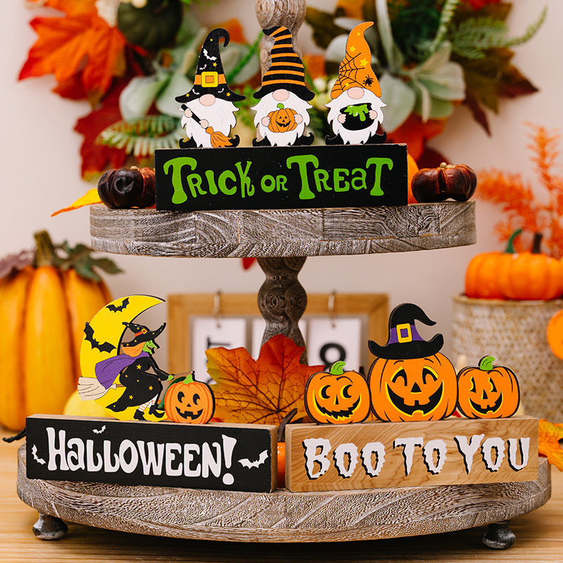 Halloween gnome trio display with pumpkins and trick or treat sign