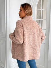 Teddy fleece jacket in watermelon pink with patch pockets and a high collar.