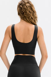 Seamless scoop neck crop top in black, showing the back view.