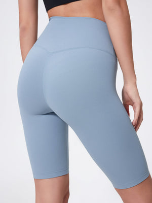 Sculpted contour active cycling shorts in light blue with a v-seam detail.