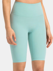 Sculpted active bike shorts in Matcha Green with a high waist and seamless design.