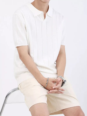 White ribbed knit polo shirt with short sleeves and a classic collar.