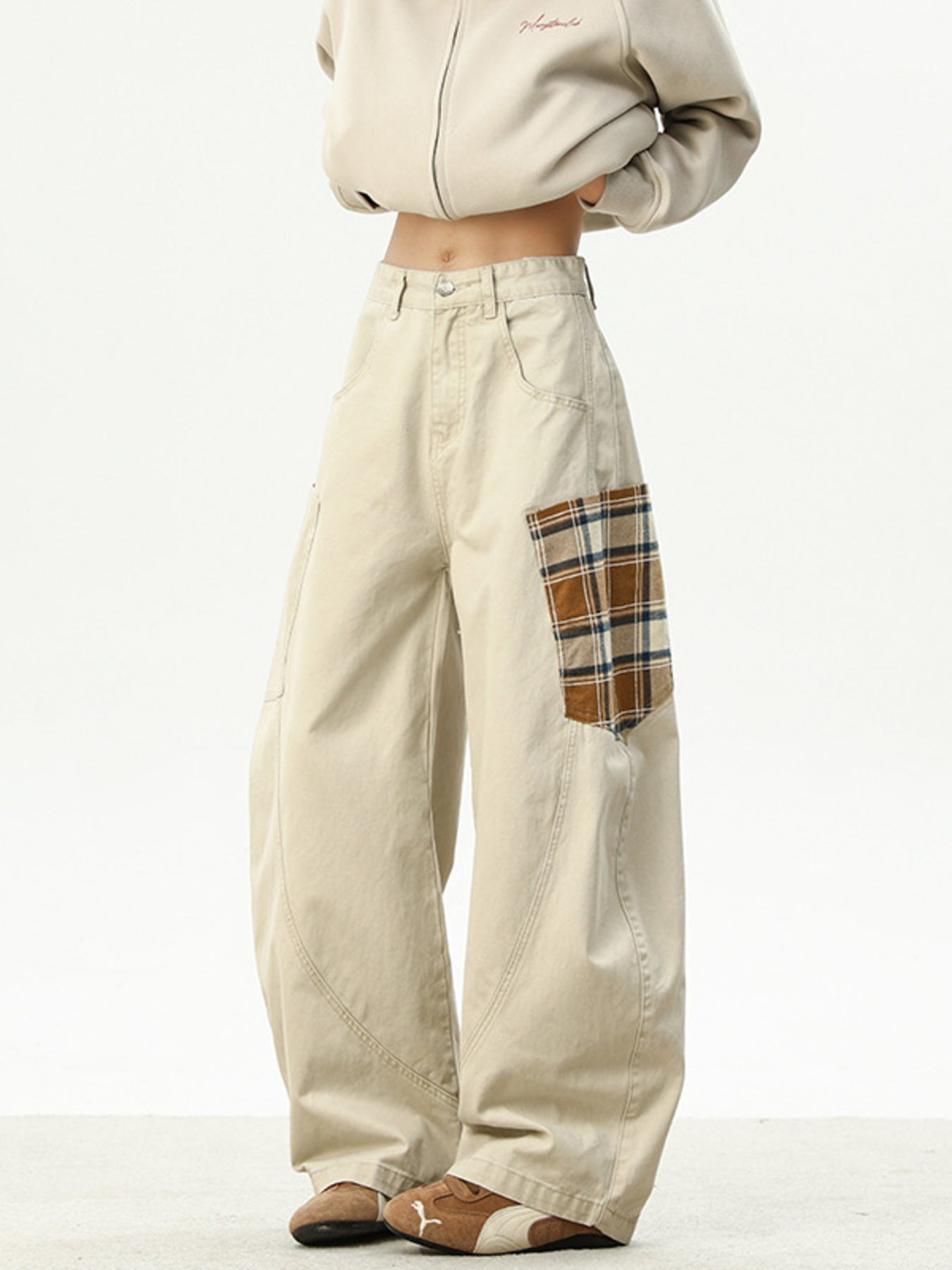 Men's beige wide leg sweatpants with plaid pocket detail
