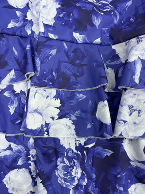 Ruffled floral two-piece set in Light Indigo polyester with tiered ruffles.