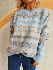 Light blue acrylic oversized sweater with Fair Isle pattern and crew neck.