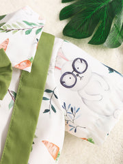 Baby shirt with bunny and carrot print, green trim, cotton.
