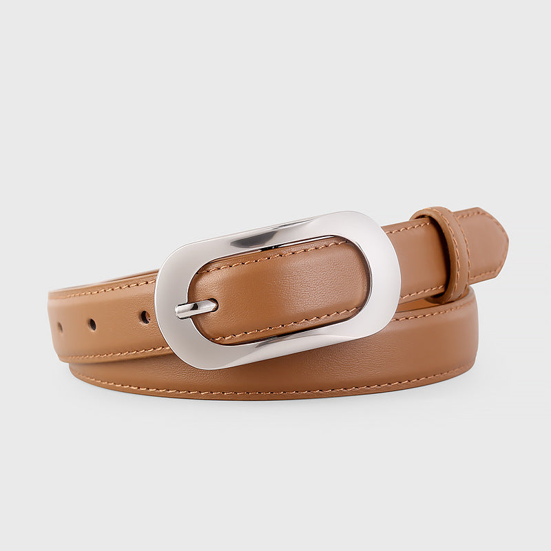 Caramel cowhide belt with polished silver buckle and stitching detail.