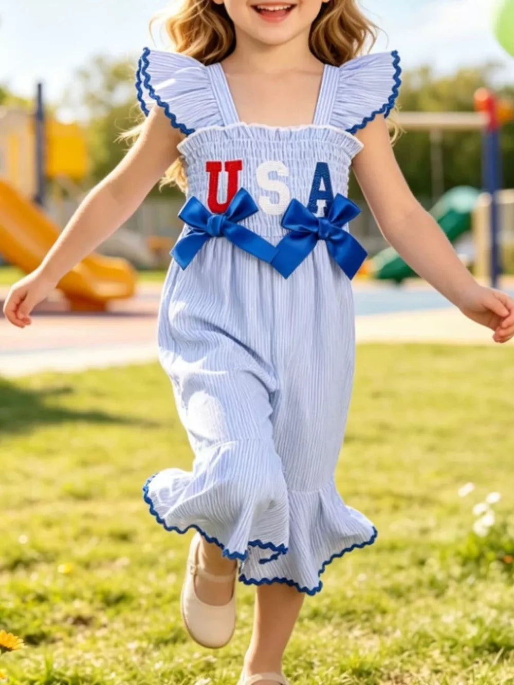 Children's Usa Themed Ruffled Sleeve Smocked Jumpsuit in Blue, side view