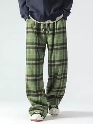 Green plaid wide-leg sweatpants with drawstring waist and relaxed fit.