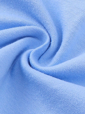 Light blue cotton fabric detail of a baby outfit