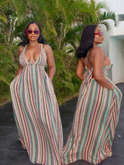 Maxi dress with deep V-neck, tie back, pockets, and colorful vertical stripes.