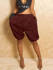 Burgundy pleated high-waisted shorts with drawstring and balloon leg