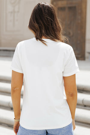 White sequin leopard motif tee with short sleeves and a crew neck.