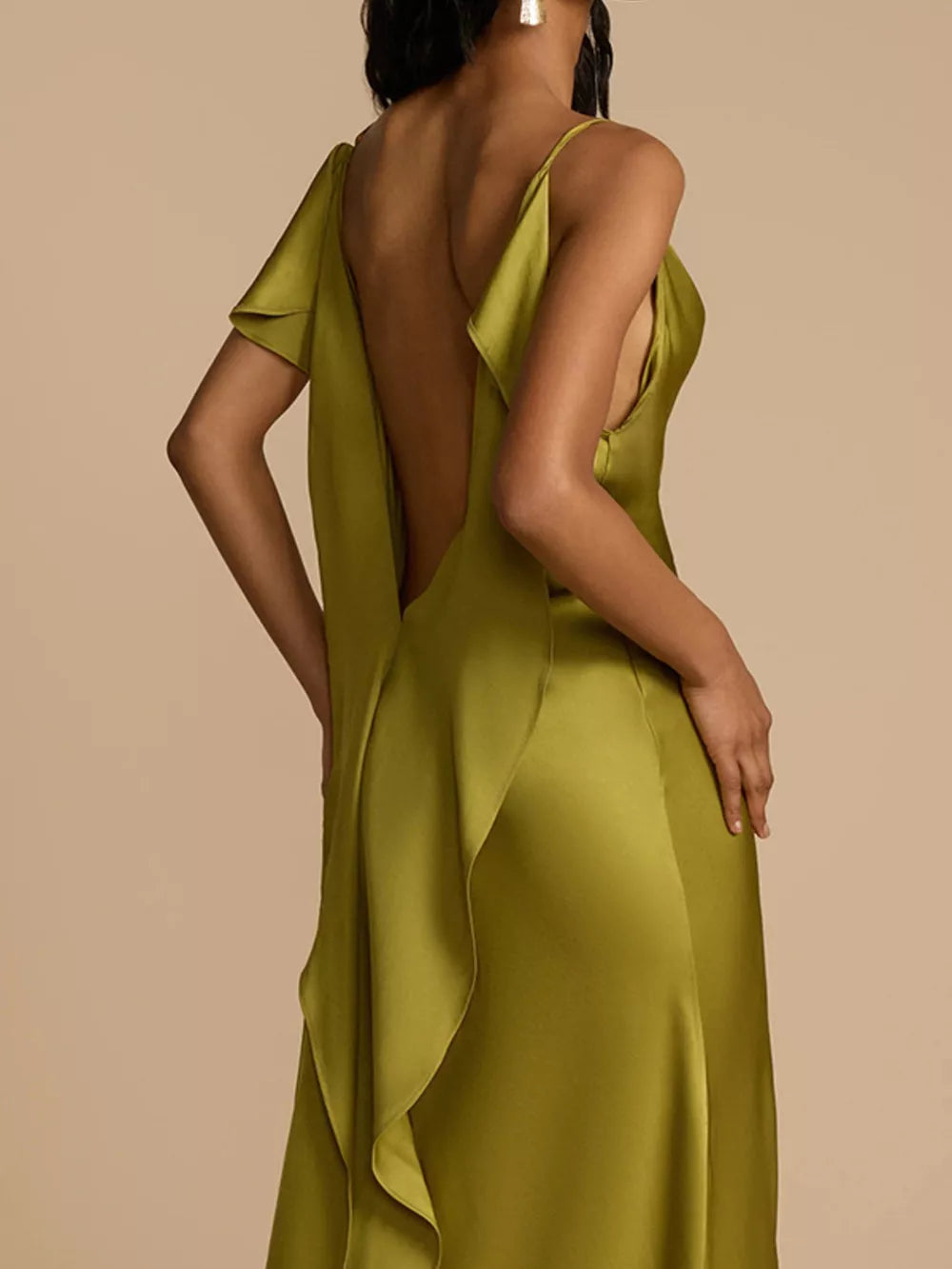 Lustrous satin maxi dress in olive green with cowl neck and open back detail.