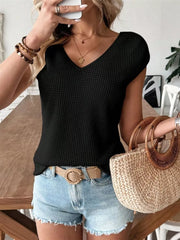 Black waffle knit V-neck shirt with cap sleeves and a bow detail.