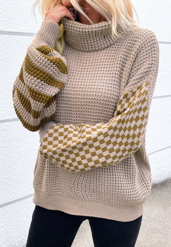 Turtleneck sweater with checkerboard and stripe sleeves in mocha acrylic knit.
