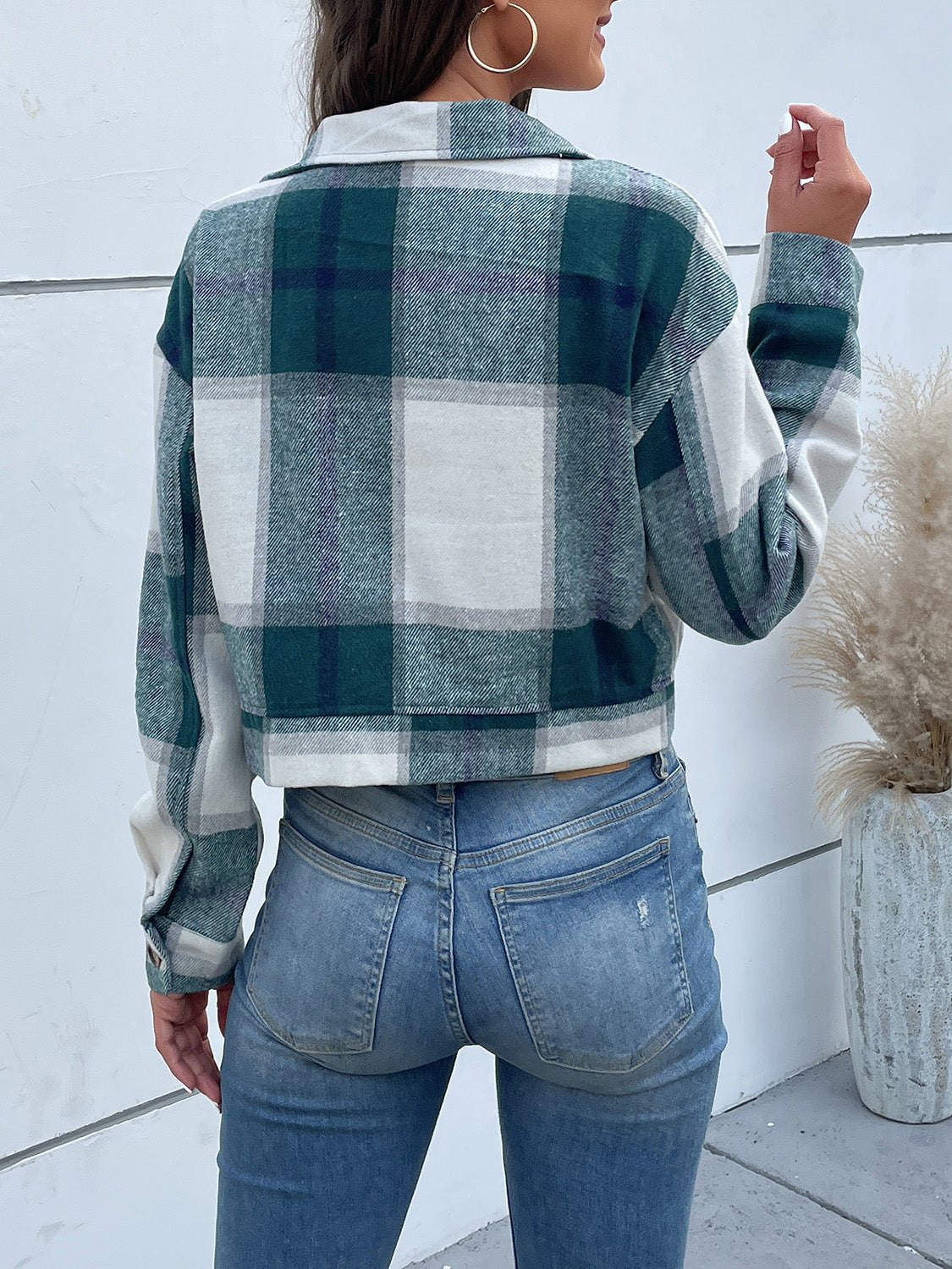 Green and white plaid shacket with buttoned cuffs and collar.