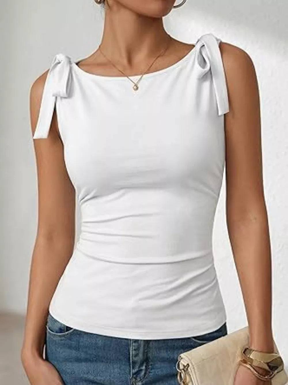 White bow-tied shoulder tank top with boat neckline and slim fit