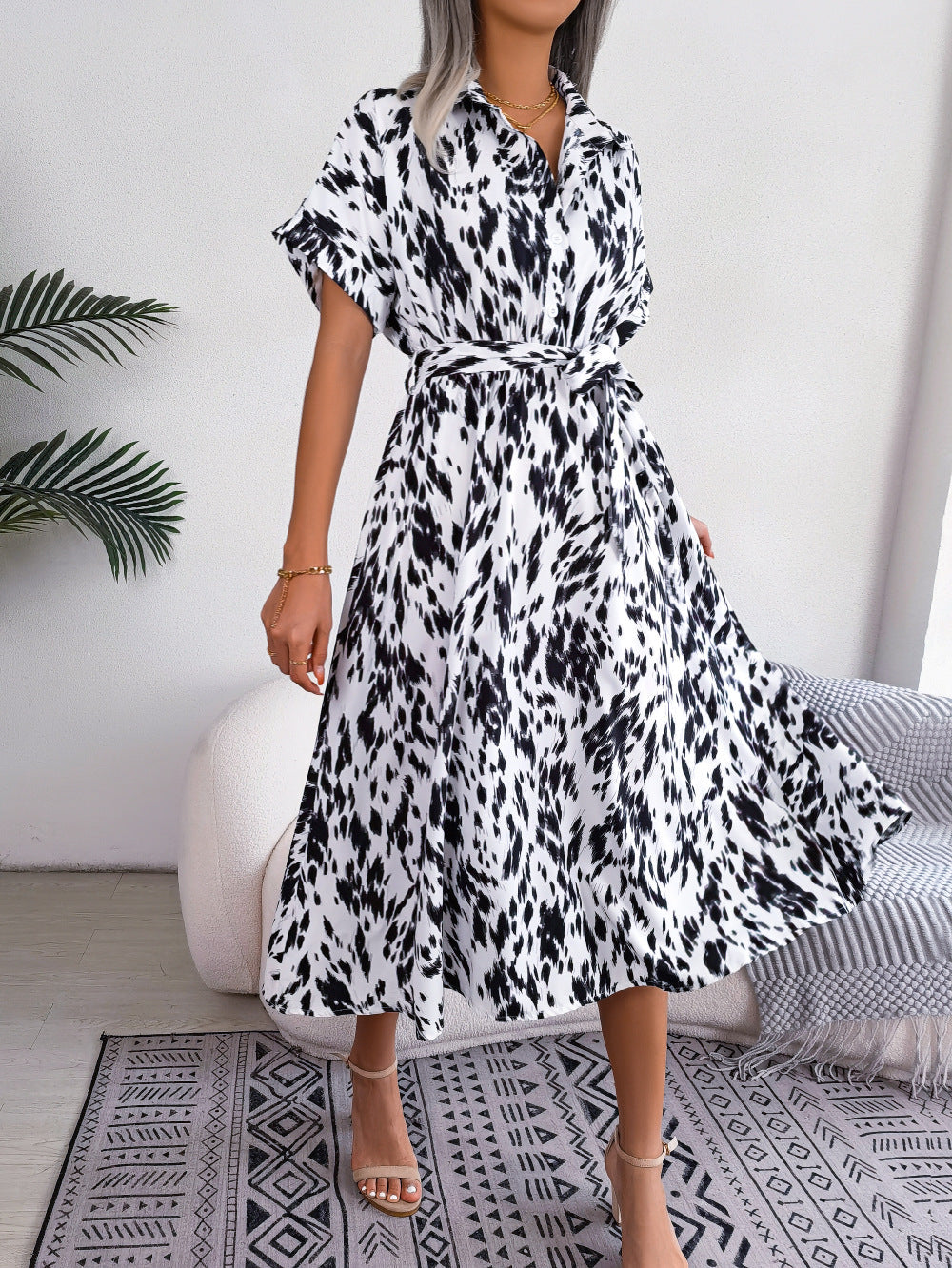 Dalmatian print midi shirt dress in white with short sleeves and a tie waist.