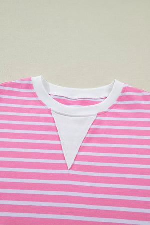 Pink and white striped cotton t-shirt with round neck and white inset detail.