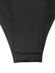 Black lace trim one shoulder bodysuit detail showing snap closure and high-cut leg.