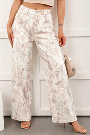 Abstract print high-waisted wide-leg cotton jeans in beige with a tie-dye effect.