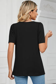 Black tee with square neck and sculpted short sleeves.