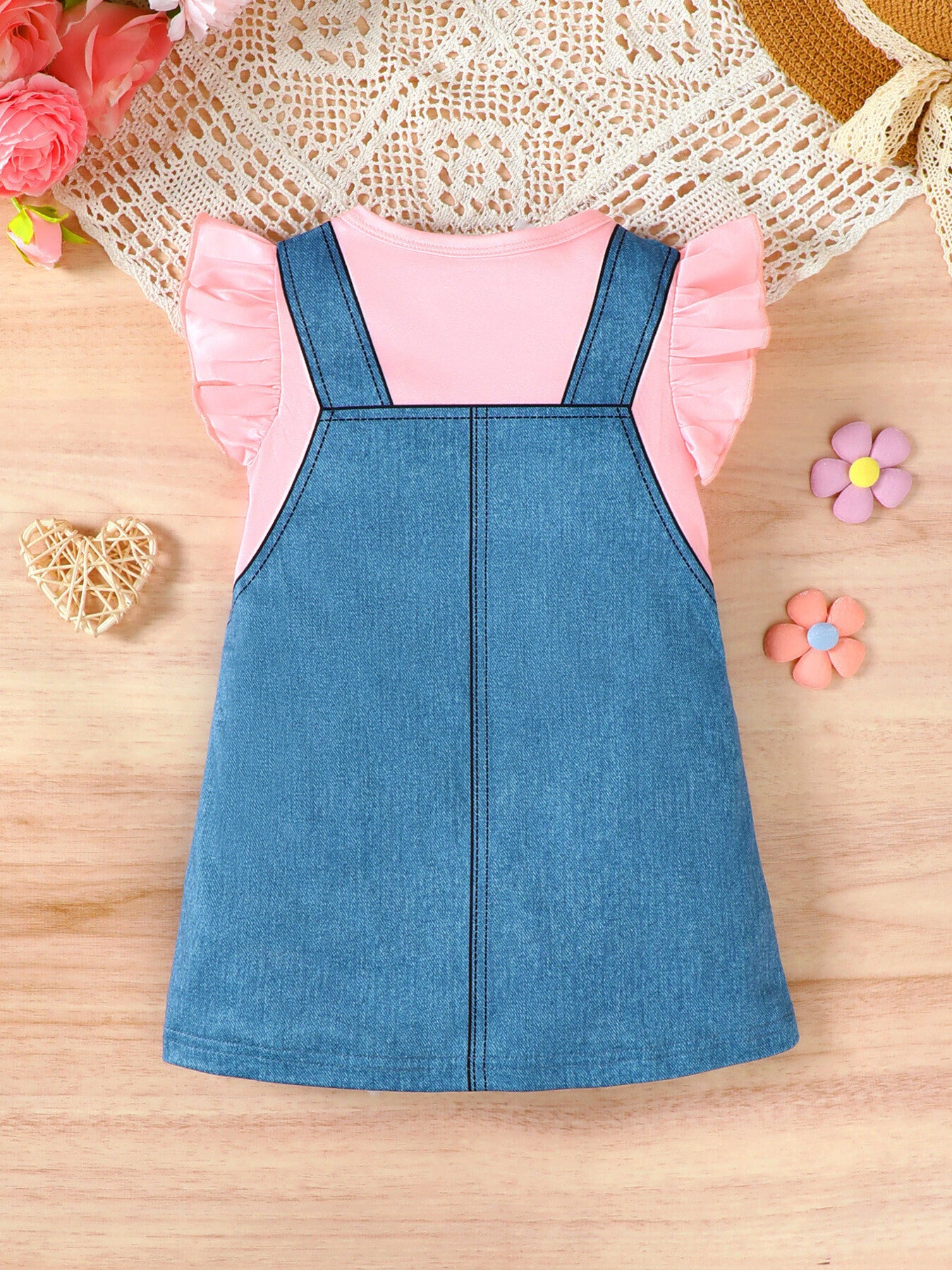 Baby denim overall dress with pink ruffle sleeve top.
