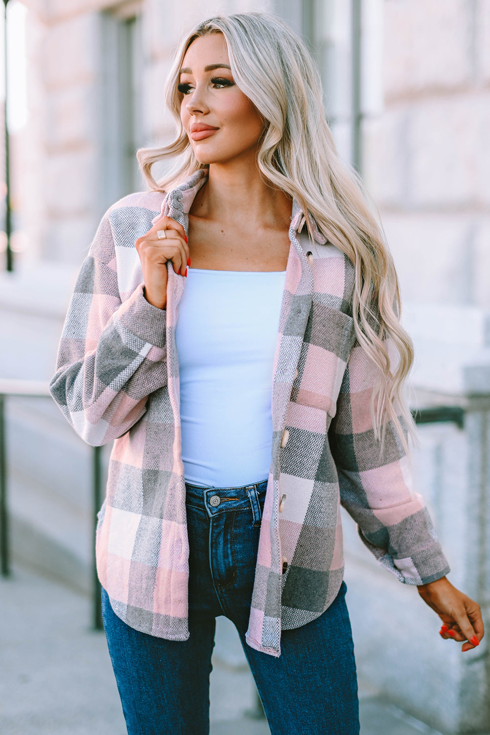 Oversized pink and gray checkered shacket with button front and patch pocket.