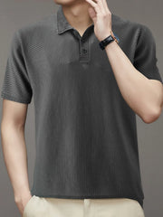 Dark gray textured knit polo shirt with short sleeves and a button placket.
