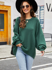 Green acrylic crewneck sweater with balloon sleeves and ribbed cuffs and hem.