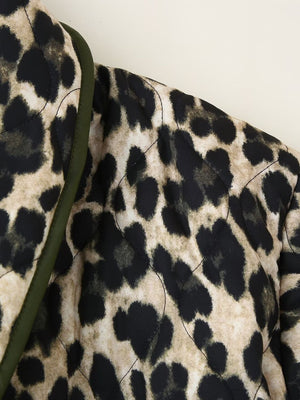 Leopard quilted kimono jacket with green trim and diamond stitching detail.