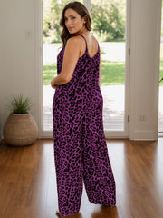 Purple leopard print cami palazzo jumpsuit with wide legs.