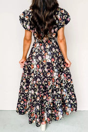 Floral tiered maxi dress with smocked waist and short sleeves.