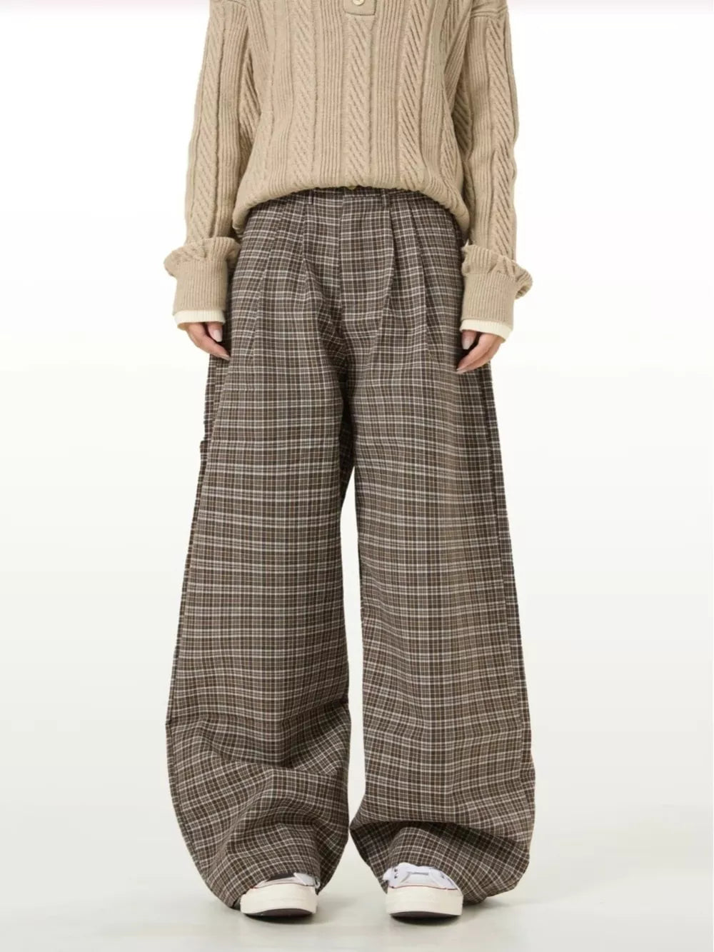 Plaid wide-leg sweatpants in brown with a casual fit.