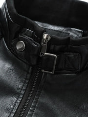 Black plus-size moto jacket with zip-up closure and snap collar detail.