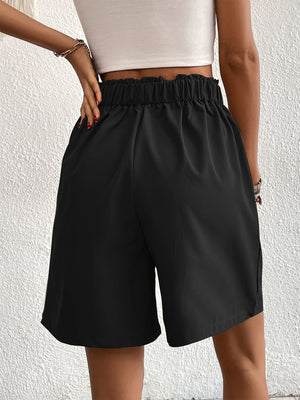 Black pleated front bermuda shorts with elastic waistband