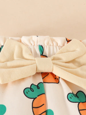 Baby set with carrot print and cream bow detail